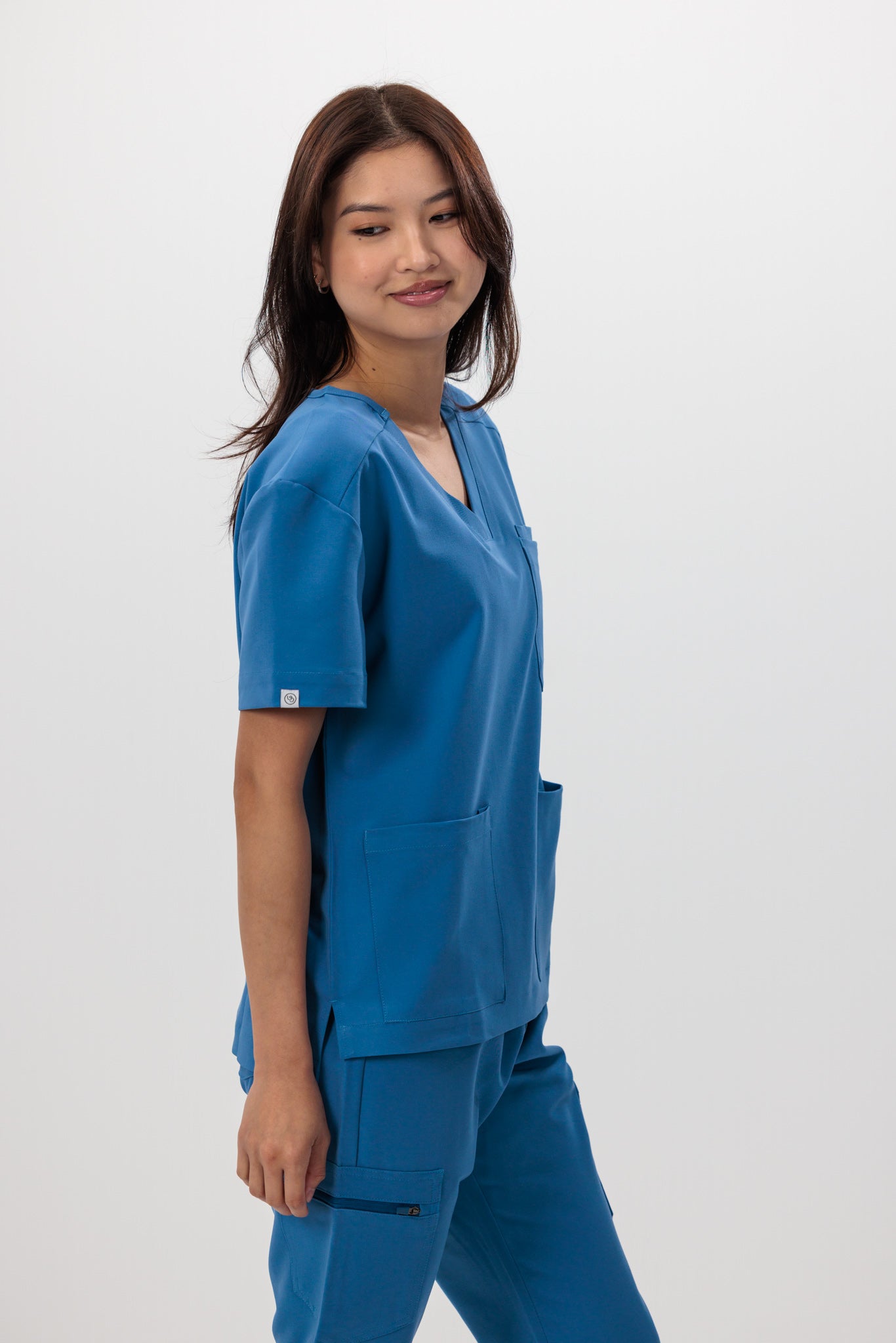 Female scrub top blue